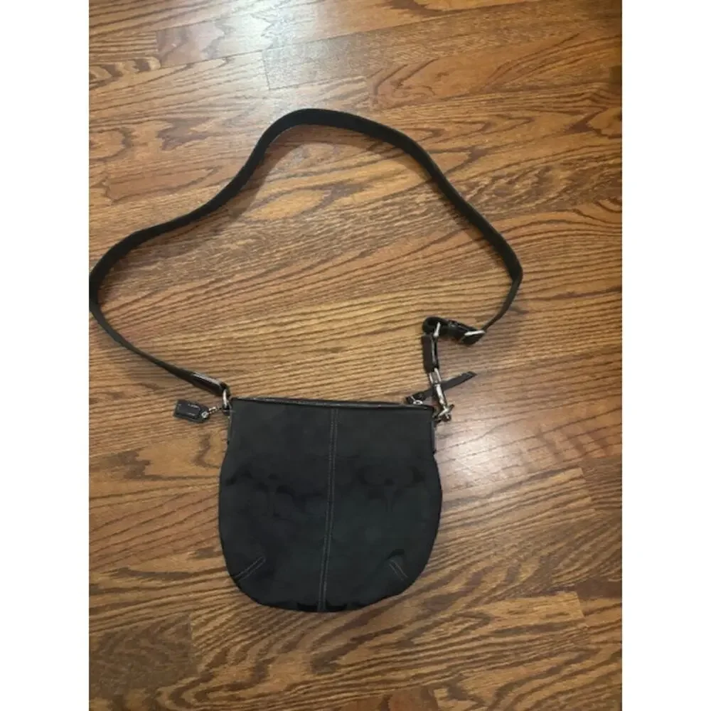 Coach crossbody handbag purse adjustable strap black jacquard logo spellout